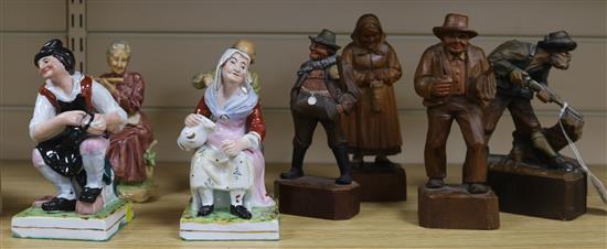A pair of Staffordshire figures, a pair of Capodimonte figures and various carved wood figures (8)